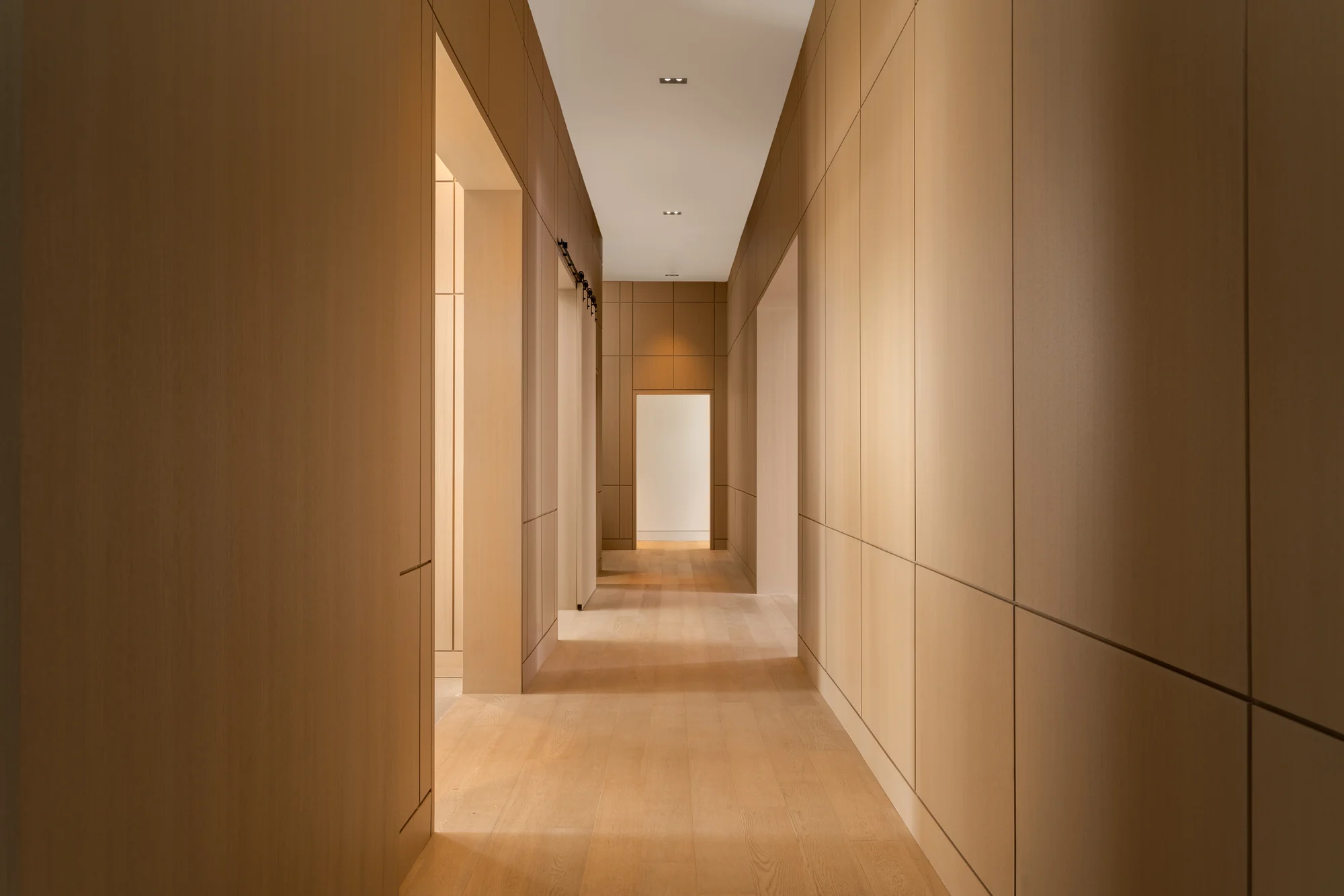Floor-to-ceiling architectural wood panelling
